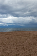 Fototapeta na wymiar cloudy weather on the sea as background