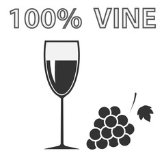 A glass of wine and a bunch of grapes
