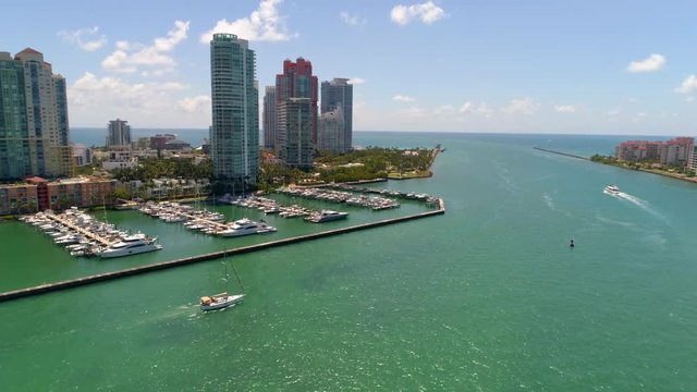 Slow motion aerial drone video Miami Beach marina south pointe