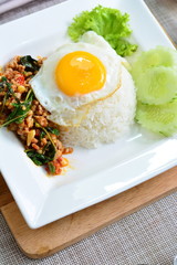 Stir fried minced chicken with basil, fried egg on rice