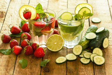 Refreshing drink with strawberry, lime and cucumber
