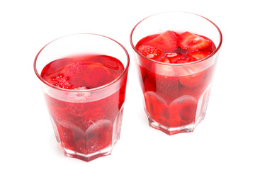 Glasses of drink with berries