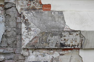 Fragment of old wall with cracked paint