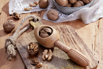 Walnuts and nutcracker close-up