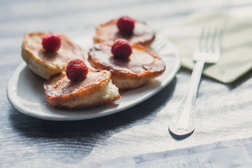 Homemade pancakes on irelke in front of the window