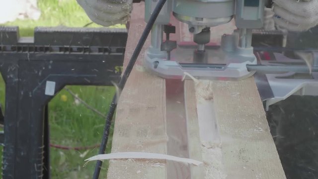 Carpenter making dap with elecrical cutter.