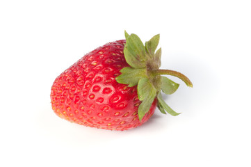 Close up of one fresh ripe strawberry isolated on white background
