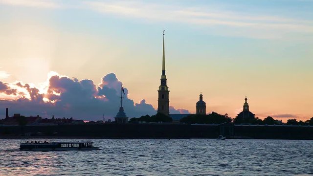 Sunset with Peter and Paul fortress, Saint-Petersburg, Russia. Ships on Neva river