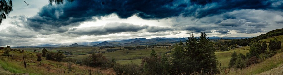 Fototapeta na wymiar Lanscape of the Drakensberge near the city of Underberg during bad weather conditions