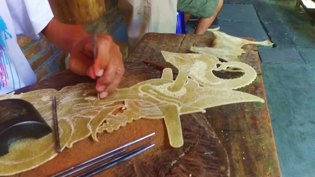 Making wajang puppets on Java Indonesia