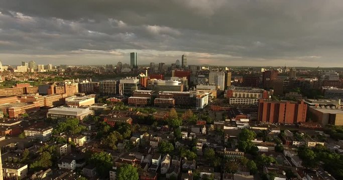 Aerial shot looking over Kendall Square and Boston Skyline in the background