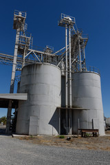 Industrial plant with storage containers and walkways