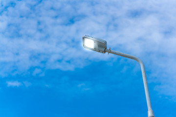 led lamp for road with blue sky and cloud background