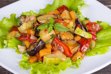 Vegetable stew in plate, close up.