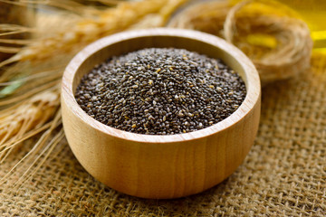Chia seeds in wood bowl