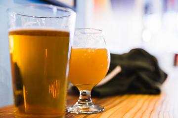 Two Beer Glasses on Counter