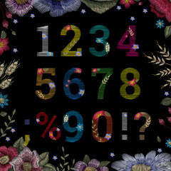 Traditional folk fashionable stylish floral embroidery stitch on a black background. Font, alphabet, sketch for print on clothes, vector