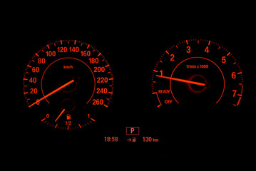 Dashboard bike display digital indicator, black background.