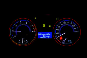 Dashboard bike display digital indicator, black background.