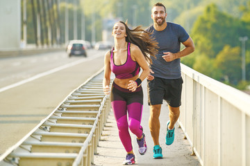 Happy Couple Exercising