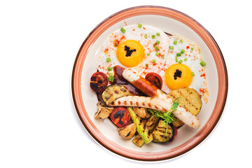 Fried eggs and grilled vegetables