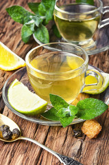 herbs tea with lime and mint leaves