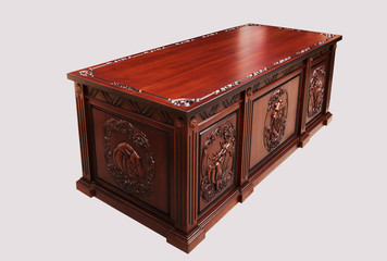 Carved wooden table on a gray background