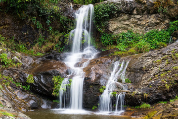 Naklejka na ściany i meble Waterfall in Sapa Town, Vietnam