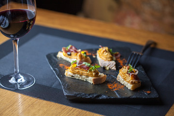 Mini sandwiches with pate in the restaurant. Restaurant food concept.