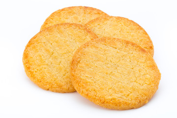 Stacked short pastry cookies isolated on white background.