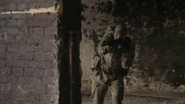 Guerilla partisan warriors operation in urban environment. War battlefield maneuvers training.