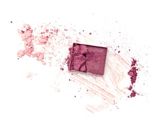 Fototapeta na wymiar Purple crushed eyeshadow on white background