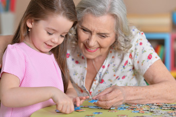 Grandmother collecting puzzle
