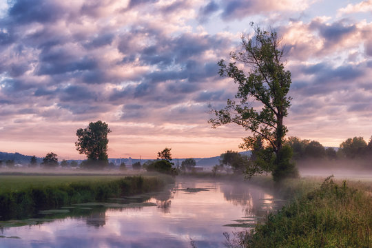 Early morning impression at the Brenz river in the Eselsburger Valley (Eselsburger Tal) near Herbrechtingen, Germany. Beauty of nature concept. Artistic style post processed photo.