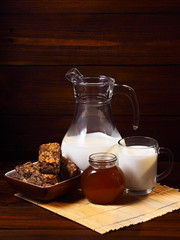 Still life with cornflakes on a wooden background
