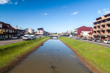 Obraz premium CAYENNE, FRENCH GUIANA - AUGUST 1, 2015: Canal Laussat in the center of Cayenne, capital of French Guiana.
