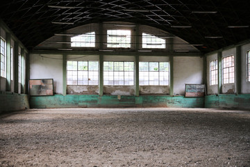 Sandy covering abandoned training arena for riders and horsemen