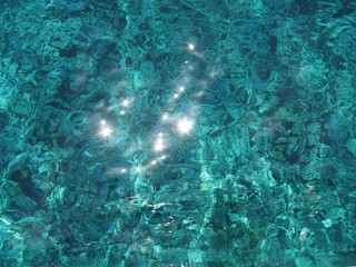 Clear water of the red sea with the reflections.