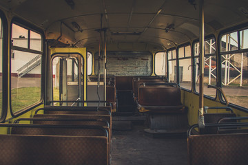 Old time bus cabin with old leather seats