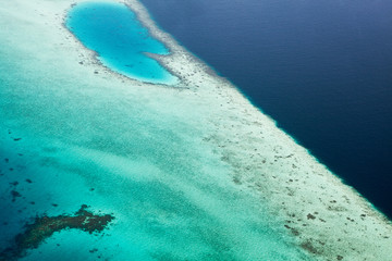 Aerial view of a reef. Beautiful bright deep colors, sea blue.