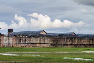 Fototapeta na wymiar Wall of prison Camp de la Transportation in St Laurent du Maroni, French Guiana.