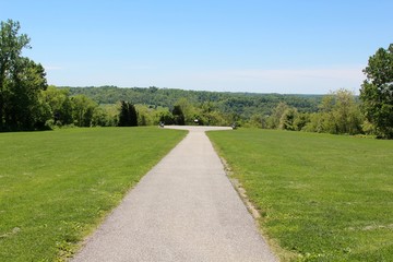 The pathway to the sitting area in the park.