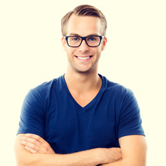 Cheerful young man in glasses