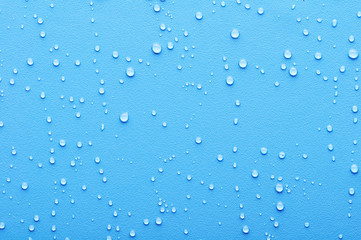 Water drops on blue background