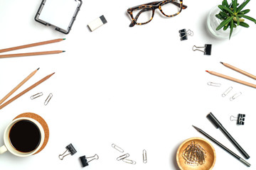 Top view workspace mockup on white background  with notebook, pen, glasses, clips and accessories.
