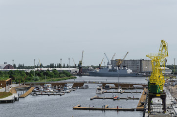 SEAPORT - Marina, Port Crane and Warship © Wojciech Wrzesień