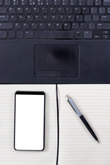 Notepad, laptop and bezel less smartphone with blank screen.