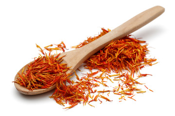 Saffron with wooden spoon