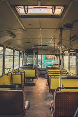 Old time bus cabin with old leather seats