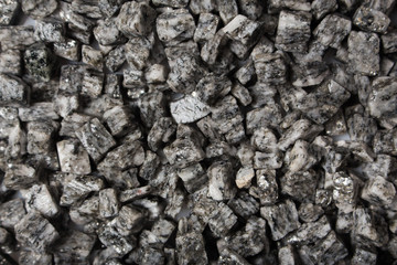 beautiful crushed granite gray on a white background